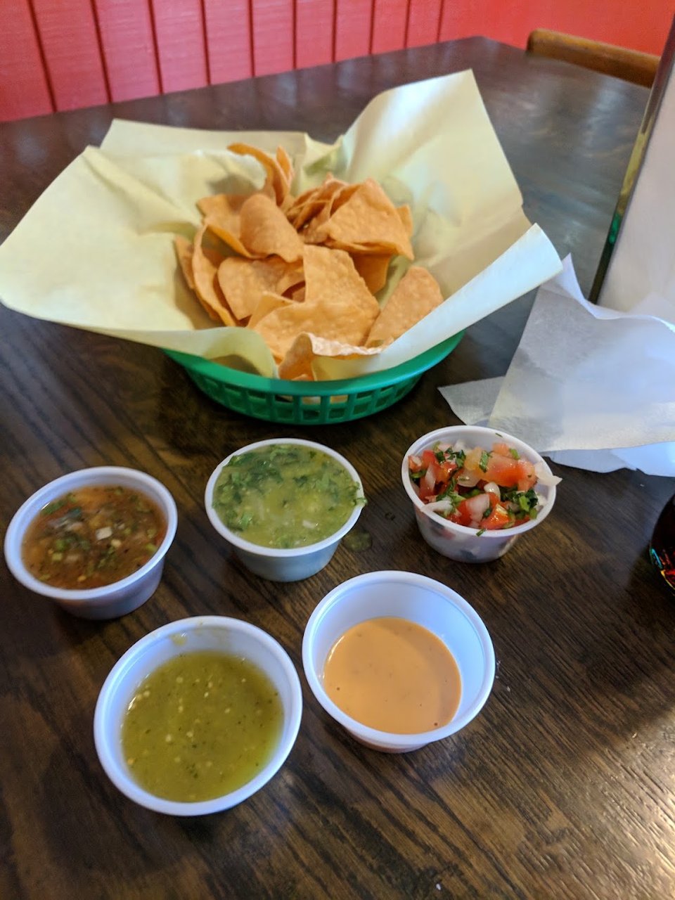 Counter menu featuring seafood cocktails and chilaquiles.