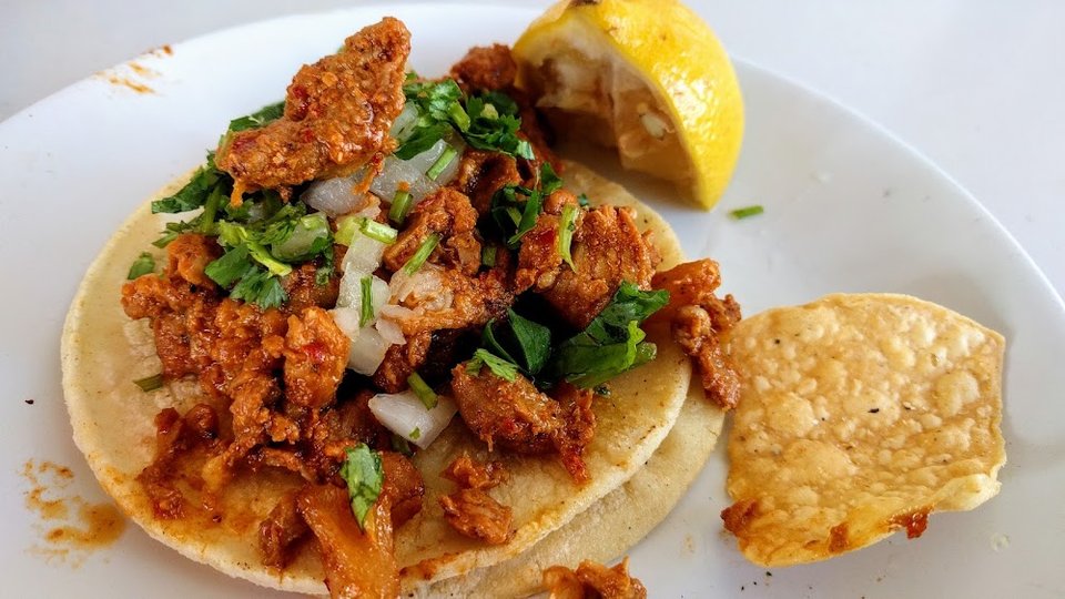 Restaurant menu highlighting Mexican breakfast and dinner plates.